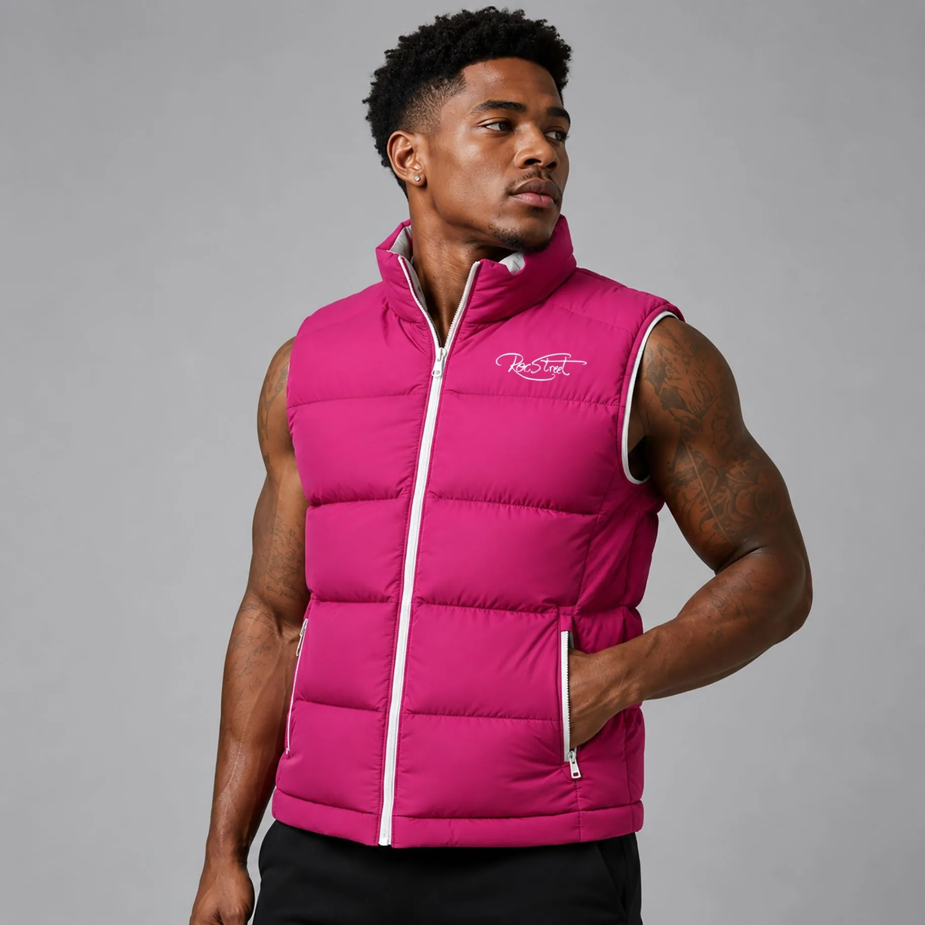 Athlete wearing a pink Roc Street vest in a studio portrait